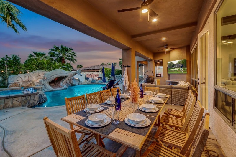 Large outdoor dining table with place settings